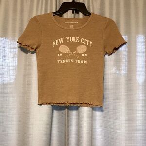 Brown American Eagle t-shirt in size extra small.